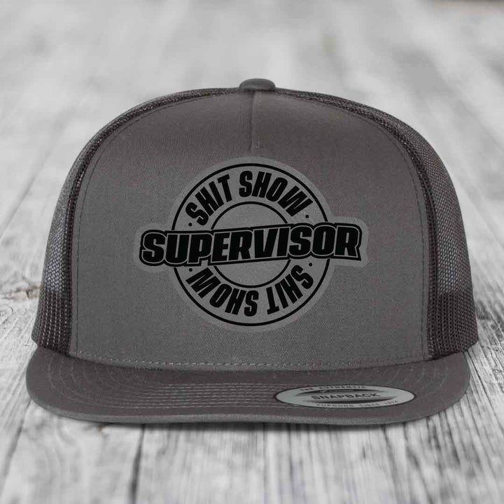 Shit Show Supervisor - Leather Patch Hat - Grey to Black Patch - Yupoong 6006 Snapback Flatbill Hat