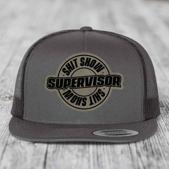 Shit Show Supervisor - Leather Patch Hat - Light Brown to Black Patch - Yupoong 6006 Snapback Flatbill Hat