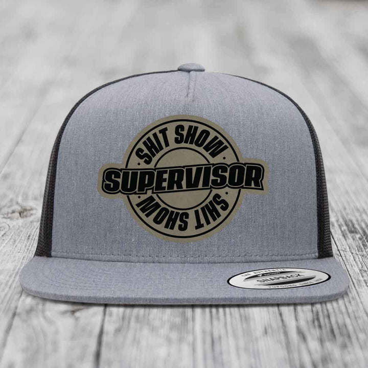Shit Show Supervisor - Leather Patch Hat - Light Brown to Black Patch - Yupoong 6006 Snapback Flatbill Hat