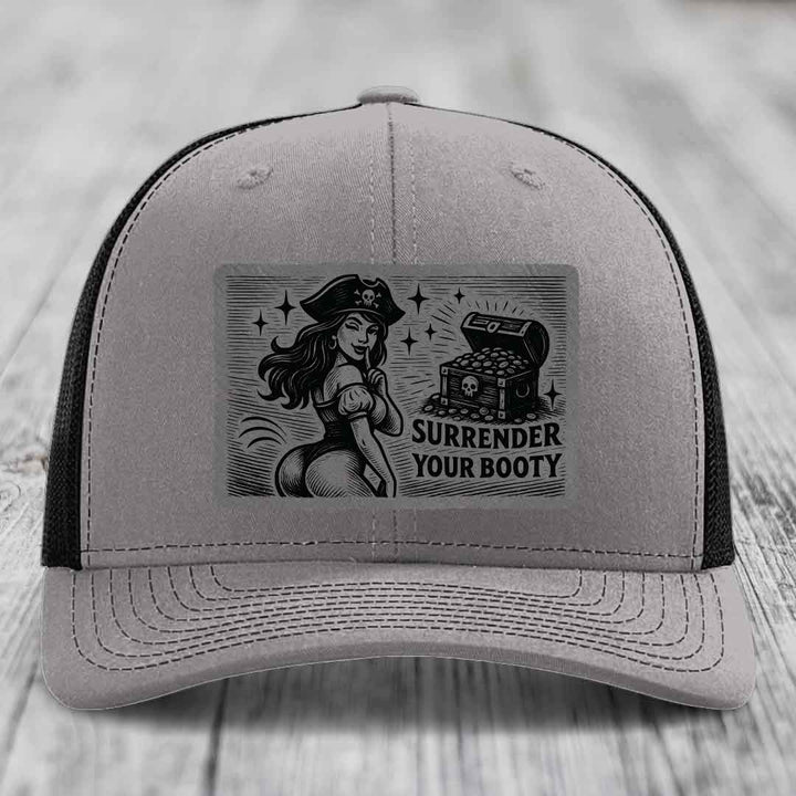 Surrender Your Booty - Leather Patch Hat - Grey to Black Patch - Richardson 112 Snapback Trucker Hat