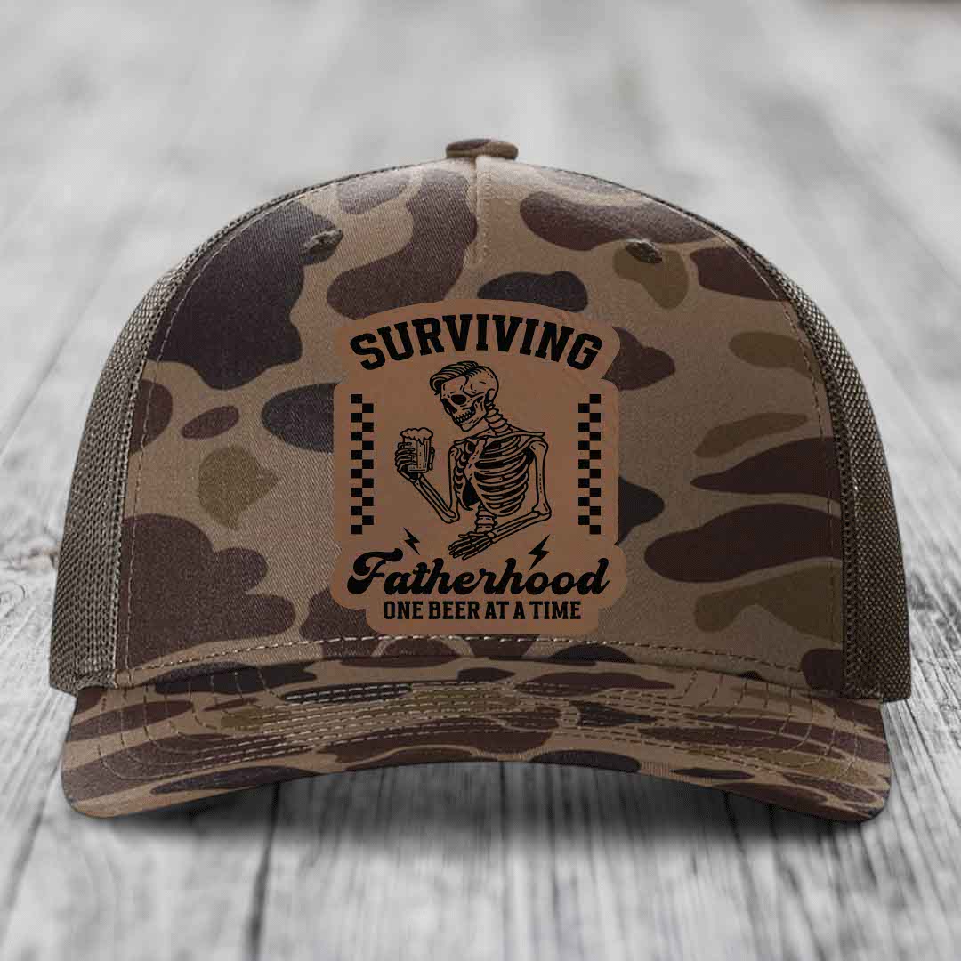 Surviving Fatherhood, One Beer At A Time - Leather Patch Hat - Dark Brown to Black Patch - Richardson 112PFP Snapback Trucker Hat