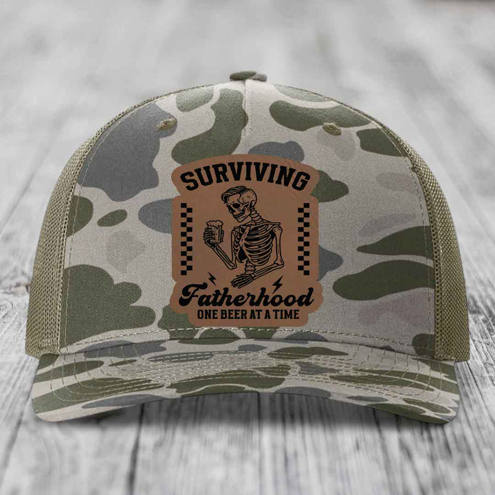Surviving Fatherhood, One Beer At A Time - Leather Patch Hat - Dark Brown to Black Patch - Richardson 112PFP Snapback Trucker Hat
