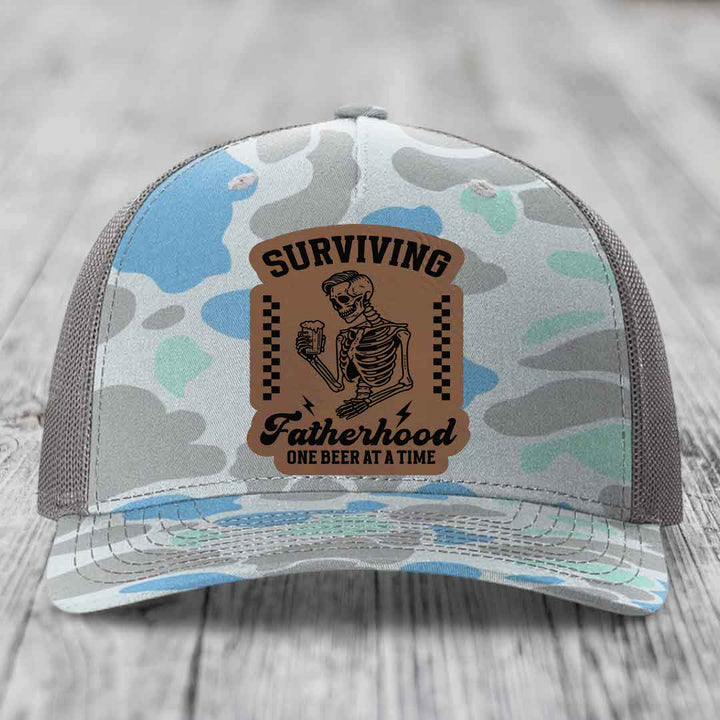Surviving Fatherhood, One Beer At A Time - Leather Patch Hat - Dark Brown to Black Patch - Richardson 112PFP Snapback Trucker Hat