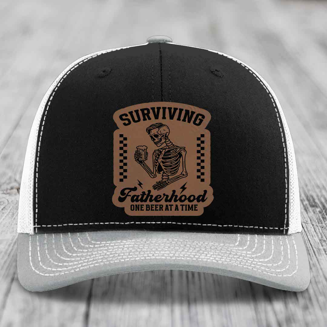 Surviving Fatherhood, One Beer At A Time - Leather Patch Hat - Dark Brown to Black Patch - Richardson 112 Snapback Trucker Hat