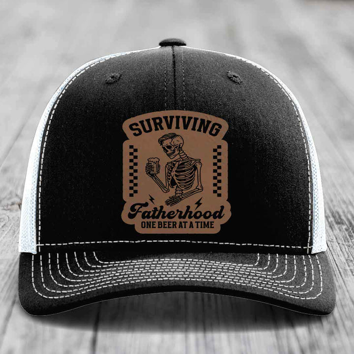 Surviving Fatherhood, One Beer At A Time - Leather Patch Hat - Dark Brown to Black Patch - Richardson 112 Snapback Trucker Hat