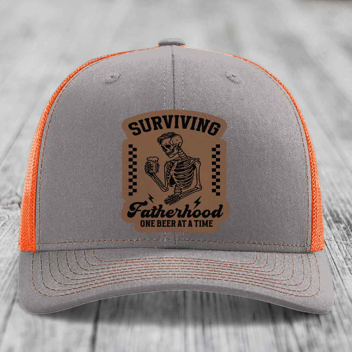 Surviving Fatherhood, One Beer At A Time - Leather Patch Hat - Dark Brown to Black Patch - Richardson 112 Snapback Trucker Hat