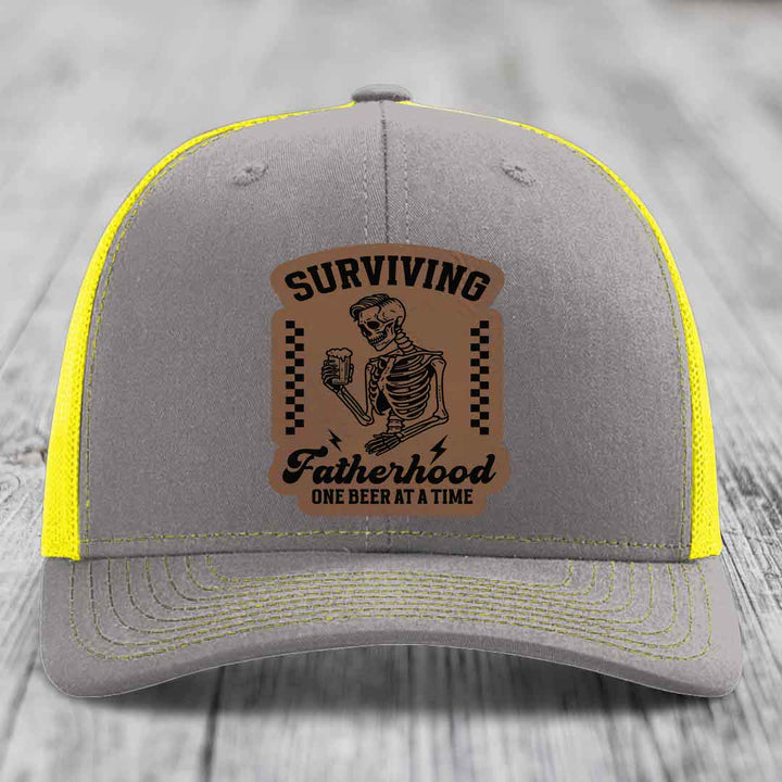 Surviving Fatherhood, One Beer At A Time - Leather Patch Hat - Dark Brown to Black Patch - Richardson 112 Snapback Trucker Hat