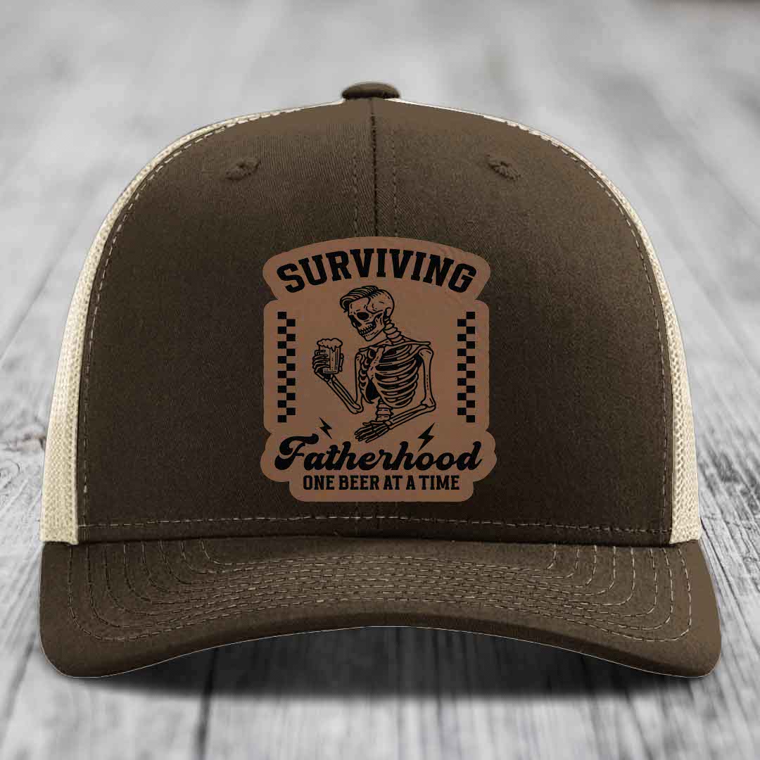 Surviving Fatherhood, One Beer At A Time - Leather Patch Hat - Dark Brown to Black Patch - Richardson 112 Snapback Trucker Hat