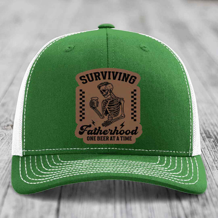 Surviving Fatherhood, One Beer At A Time - Leather Patch Hat - Dark Brown to Black Patch - Richardson 112 Snapback Trucker Hat