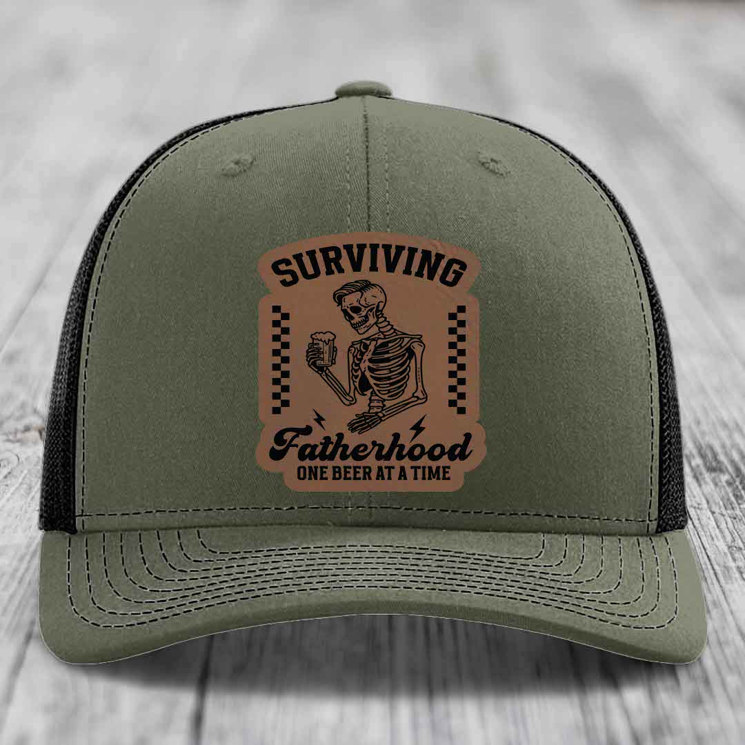 Surviving Fatherhood, One Beer At A Time - Leather Patch Hat - Dark Brown to Black Patch - Richardson 112 Snapback Trucker Hat