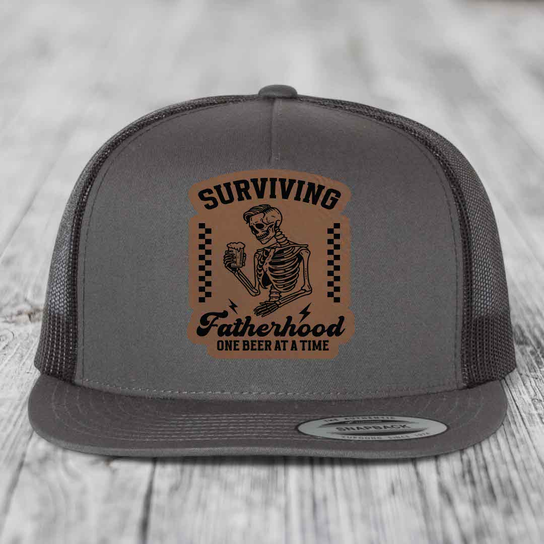 Surviving Fatherhood, One Beer At A Time - Leather Patch Hat - Dark Brown to Black Patch - Yupoong 6006 Snapback Flatbill Hat