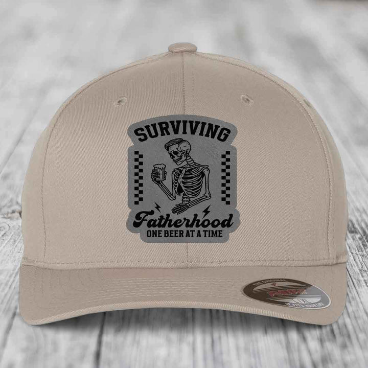 Surviving Fatherhood, One Beer At A Time - Leather Patch Hat - Grey to Black Patch - Flexfit 6277 Fitted Hat
