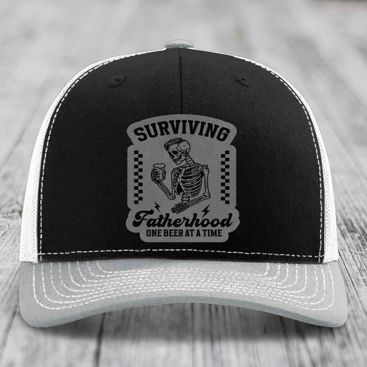 Surviving Fatherhood, One Beer At A Time - Leather Patch Hat - Grey to Black Patch - Richardson 112 Snapback Trucker Hat