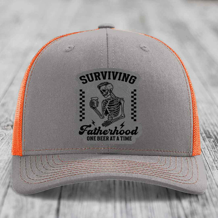 Surviving Fatherhood, One Beer At A Time - Leather Patch Hat - Grey to Black Patch - Richardson 112 Snapback Trucker Hat