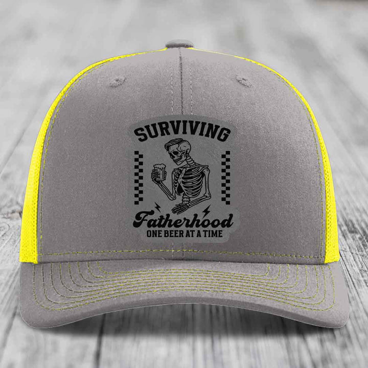Surviving Fatherhood, One Beer At A Time - Leather Patch Hat - Grey to Black Patch - Richardson 112 Snapback Trucker Hat