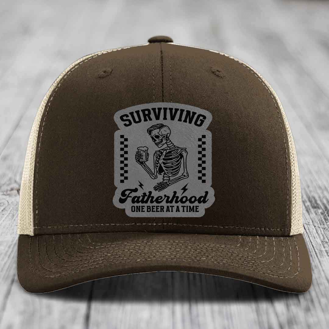 Surviving Fatherhood, One Beer At A Time - Leather Patch Hat - Grey to Black Patch - Richardson 112 Snapback Trucker Hat