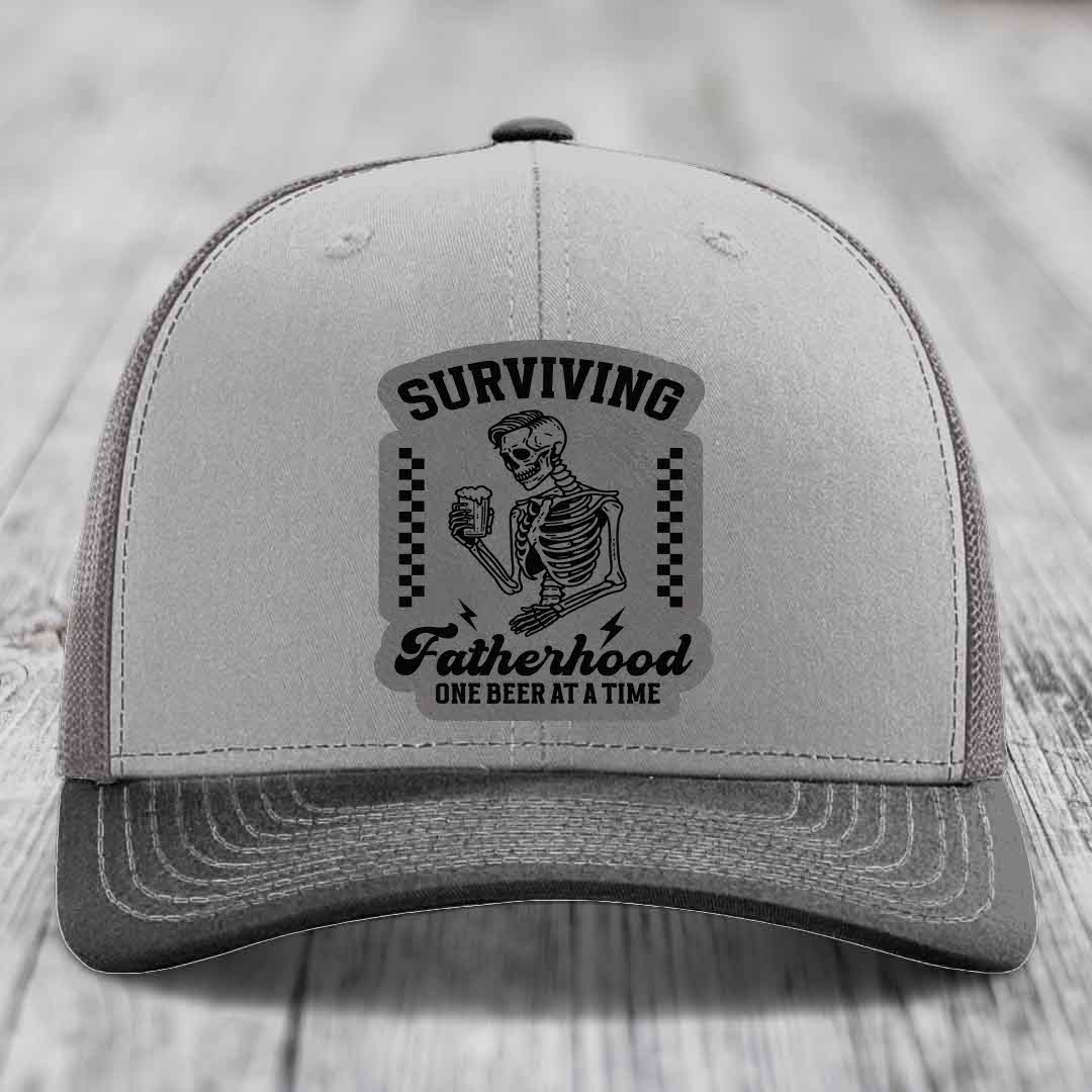 Surviving Fatherhood, One Beer At A Time - Leather Patch Hat - Grey to Black Patch - Richardson 112 Snapback Trucker Hat