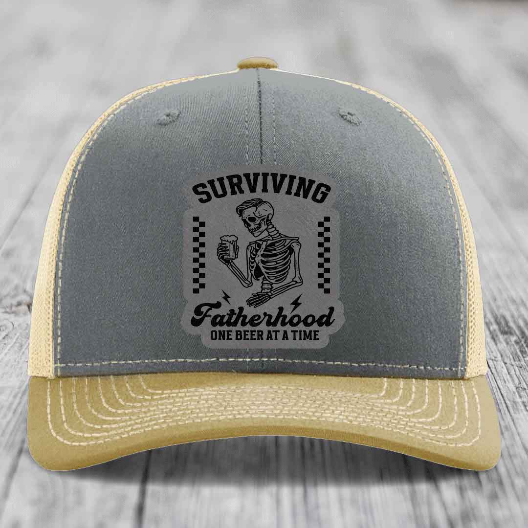 Surviving Fatherhood, One Beer At A Time - Leather Patch Hat - Grey to Black Patch - Richardson 112 Snapback Trucker Hat