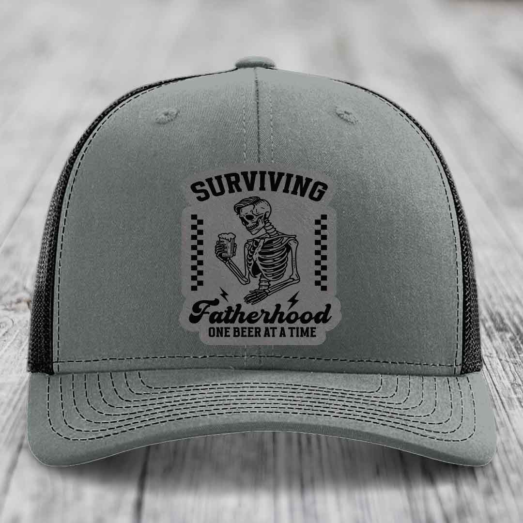 Surviving Fatherhood, One Beer At A Time - Leather Patch Hat - Grey to Black Patch - Richardson 112 Snapback Trucker Hat