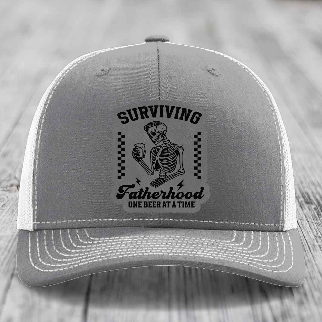 Surviving Fatherhood, One Beer At A Time - Leather Patch Hat - Grey to Black Patch - Richardson 112 Snapback Trucker Hat
