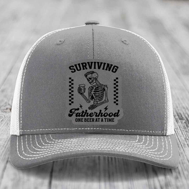 Surviving Fatherhood, One Beer At A Time - Leather Patch Hat - Grey to Black Patch - Richardson 112 Snapback Trucker Hat