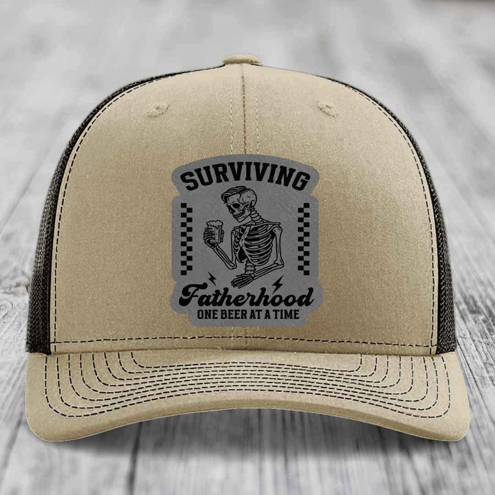 Surviving Fatherhood, One Beer At A Time - Leather Patch Hat - Grey to Black Patch - Richardson 112 Snapback Trucker Hat