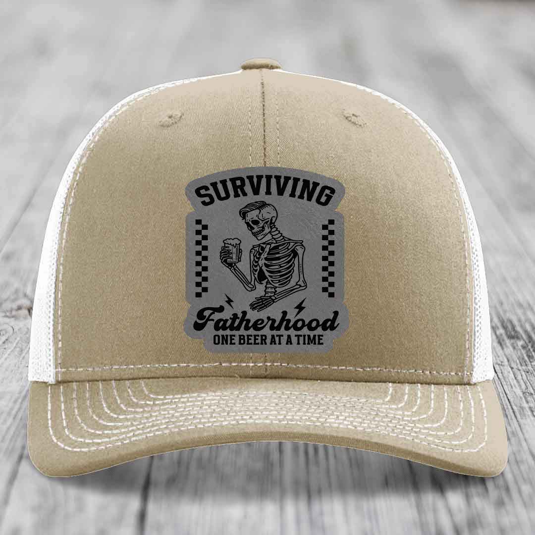 Surviving Fatherhood, One Beer At A Time - Leather Patch Hat - Grey to Black Patch - Richardson 112 Snapback Trucker Hat