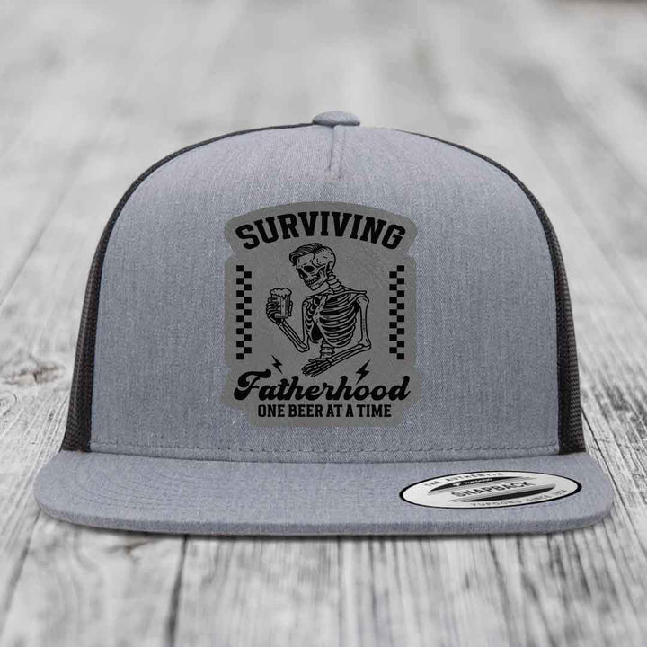 Surviving Fatherhood, One Beer At A Time - Leather Patch Hat - Grey to Black Patch - Yupoong 6006 Snapback Flatbill Hat