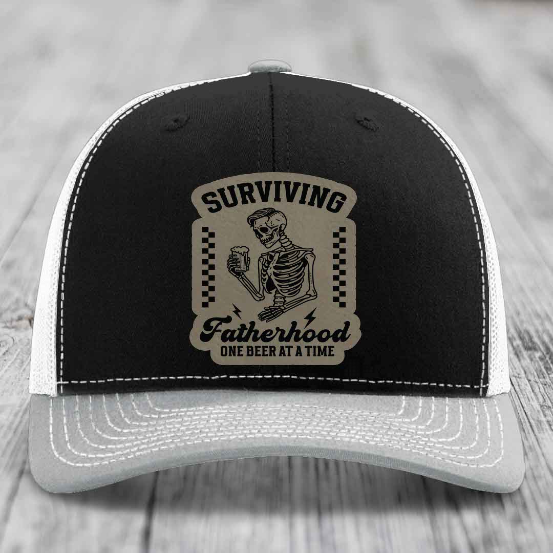 Surviving Fatherhood, One Beer At A Time - Leather Patch Hat - Light Brown to Black Patch - Richardson 112 Snapback Trucker Hat