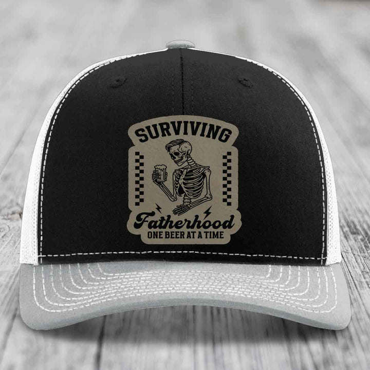 Surviving Fatherhood, One Beer At A Time - Leather Patch Hat - Light Brown to Black Patch - Richardson 112 Snapback Trucker Hat