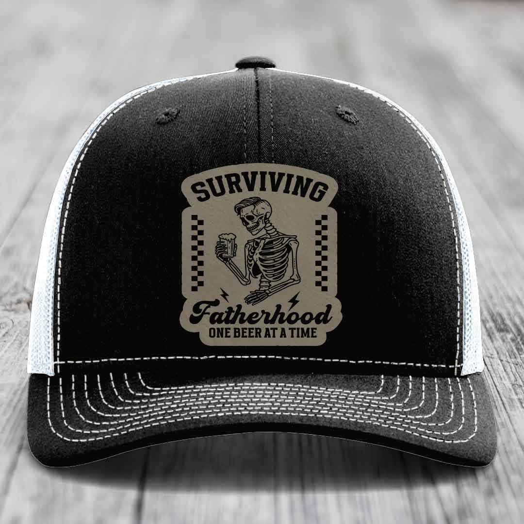Surviving Fatherhood, One Beer At A Time - Leather Patch Hat - Light Brown to Black Patch - Richardson 112 Snapback Trucker Hat