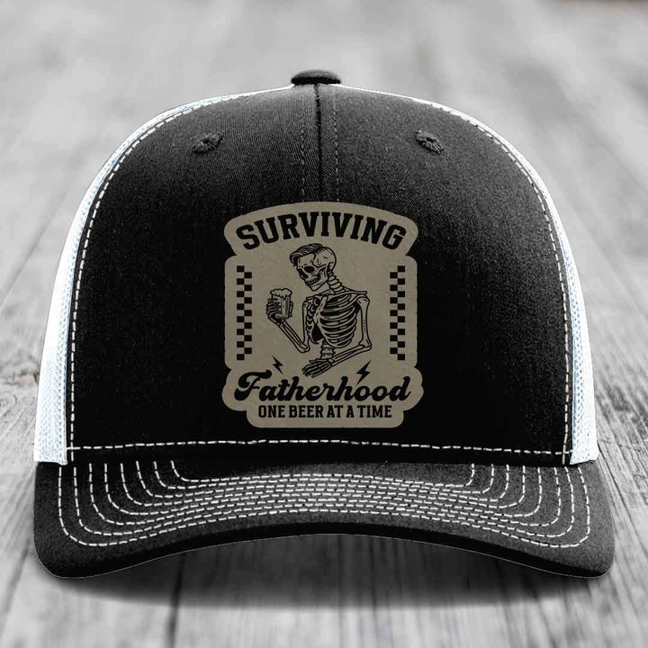 Surviving Fatherhood, One Beer At A Time - Leather Patch Hat - Light Brown to Black Patch - Richardson 112 Snapback Trucker Hat