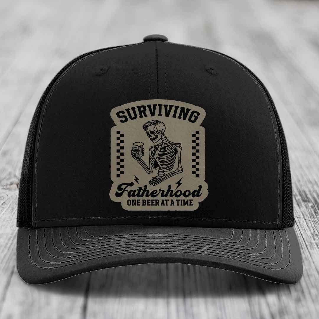 Surviving Fatherhood, One Beer At A Time - Leather Patch Hat - Light Brown to Black Patch - Richardson 112 Snapback Trucker Hat