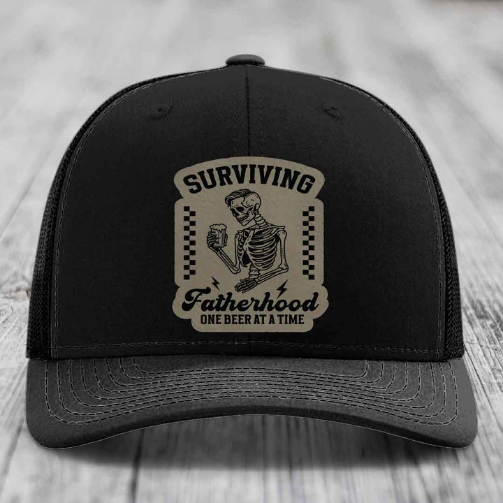 Surviving Fatherhood, One Beer At A Time - Leather Patch Hat - Light Brown to Black Patch - Richardson 112 Snapback Trucker Hat