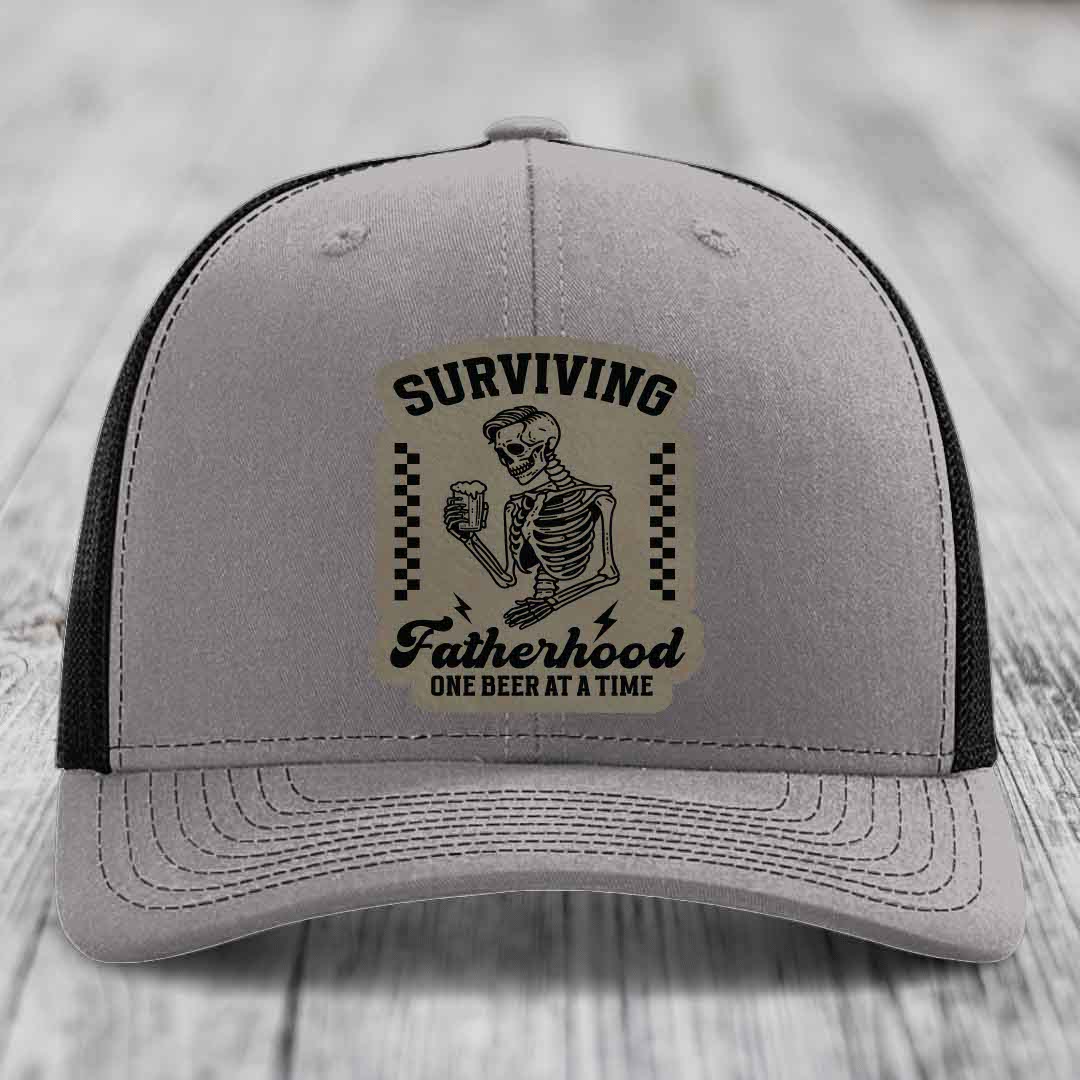 Surviving Fatherhood, One Beer At A Time - Leather Patch Hat - Light Brown to Black Patch - Richardson 112 Snapback Trucker Hat