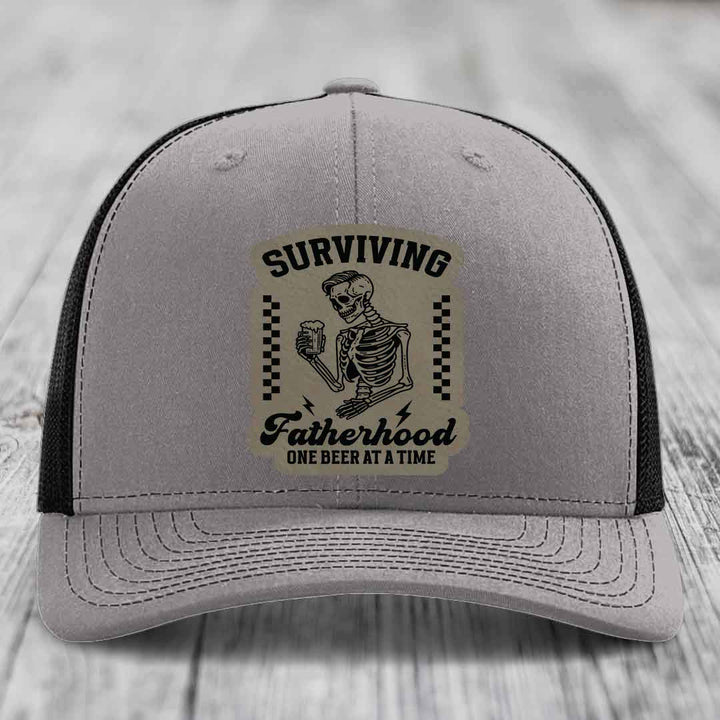 Surviving Fatherhood, One Beer At A Time - Leather Patch Hat - Light Brown to Black Patch - Richardson 112 Snapback Trucker Hat