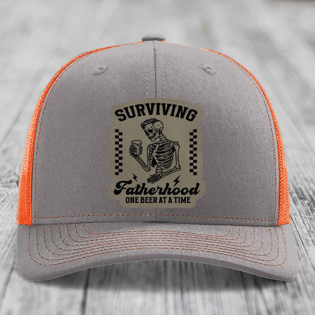 Surviving Fatherhood, One Beer At A Time - Leather Patch Hat - Light Brown to Black Patch - Richardson 112 Snapback Trucker Hat