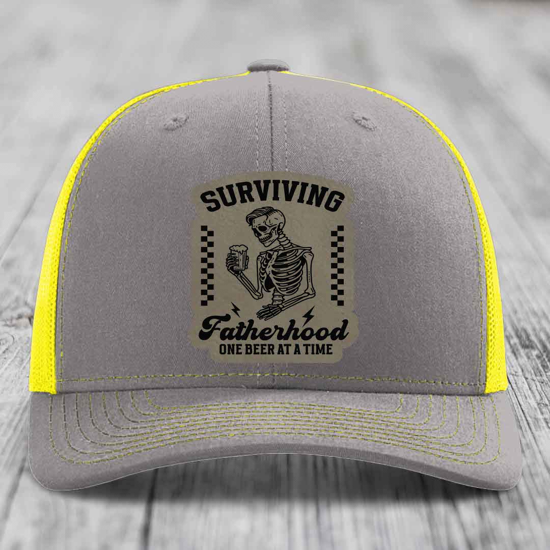 Surviving Fatherhood, One Beer At A Time - Leather Patch Hat - Light Brown to Black Patch - Richardson 112 Snapback Trucker Hat