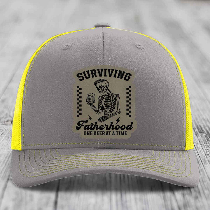 Surviving Fatherhood, One Beer At A Time - Leather Patch Hat - Light Brown to Black Patch - Richardson 112 Snapback Trucker Hat