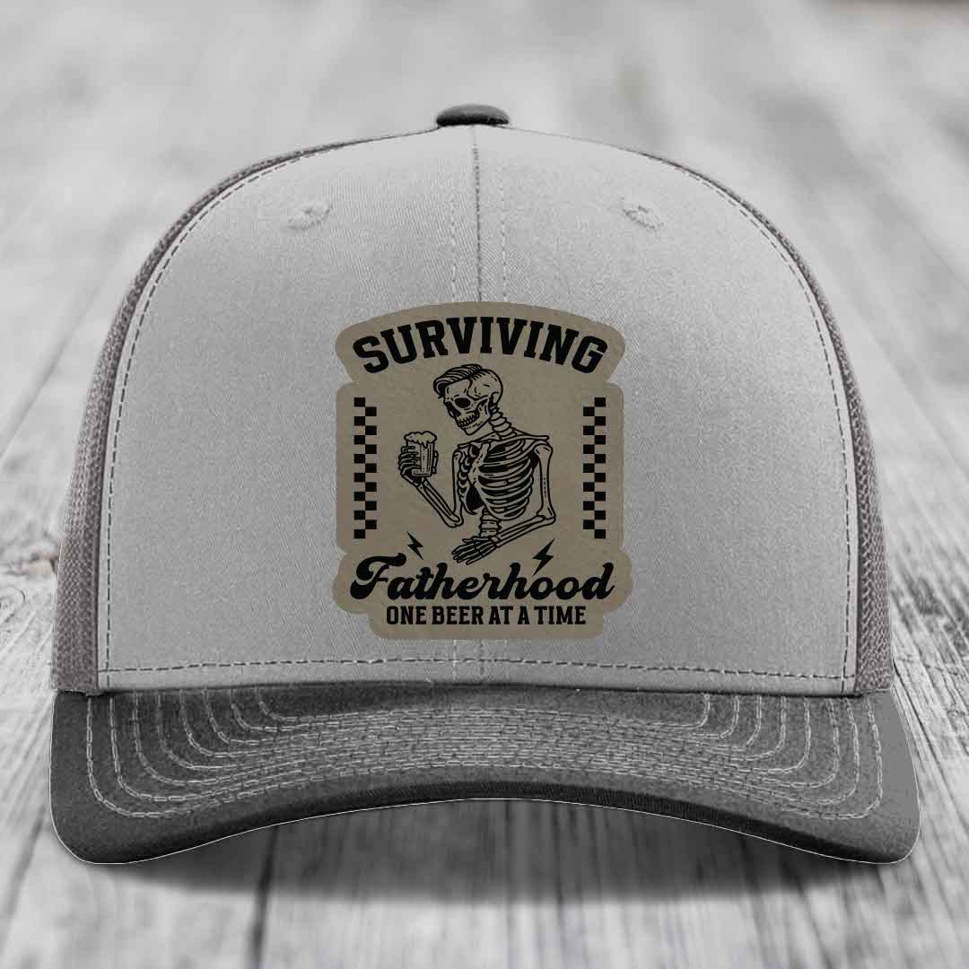 Surviving Fatherhood, One Beer At A Time - Leather Patch Hat - Light Brown to Black Patch - Richardson 112 Snapback Trucker Hat