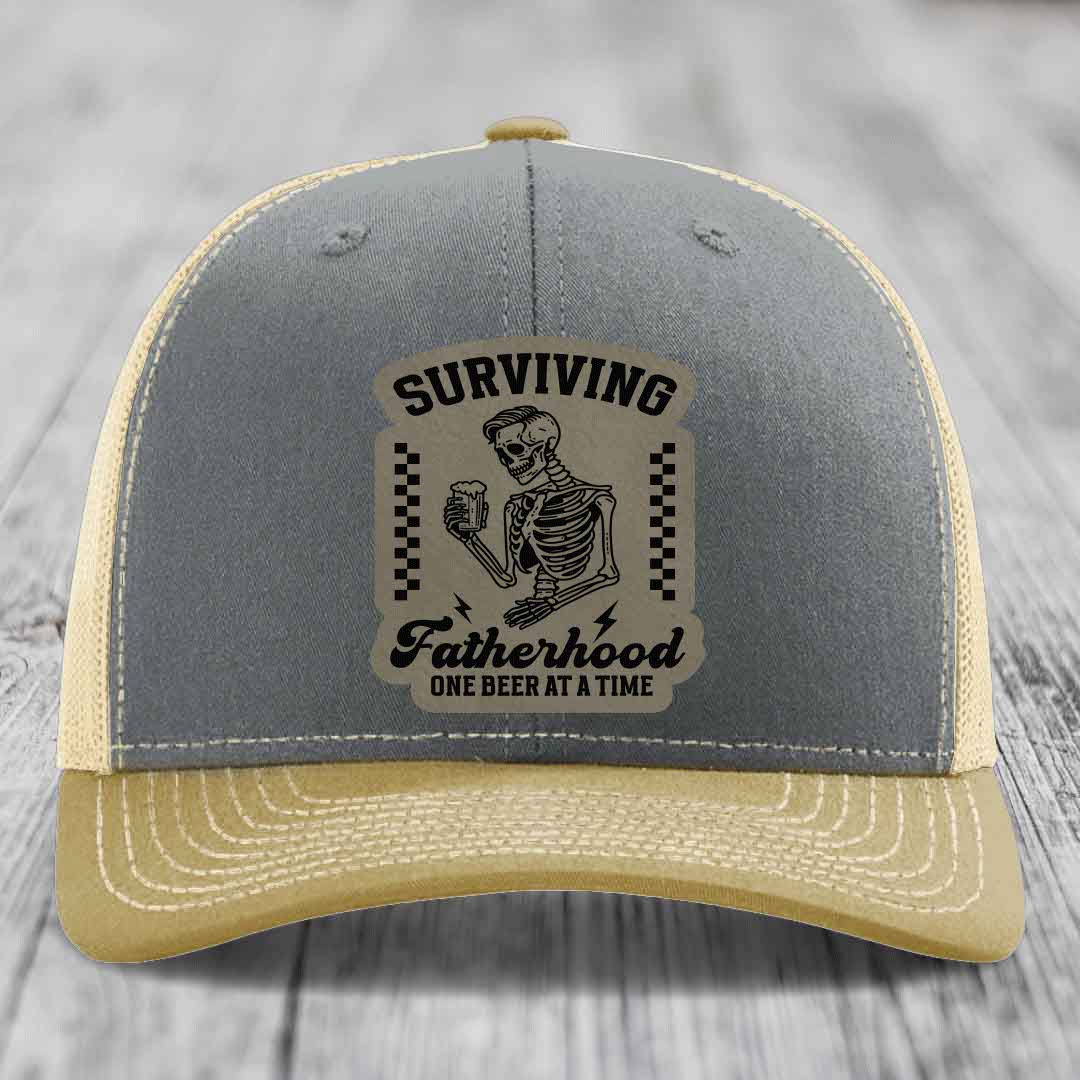 Surviving Fatherhood, One Beer At A Time - Leather Patch Hat - Light Brown to Black Patch - Richardson 112 Snapback Trucker Hat