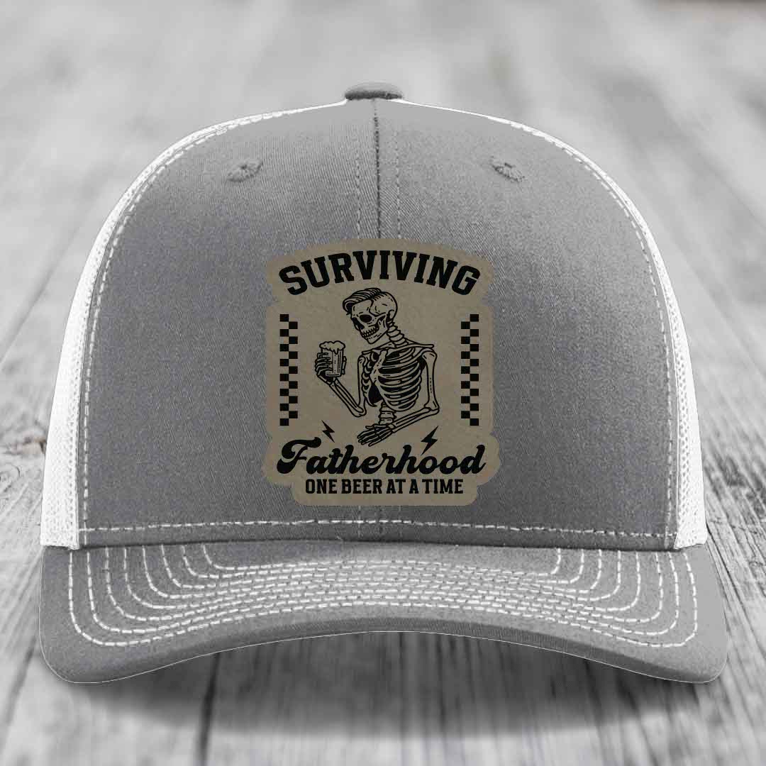 Surviving Fatherhood, One Beer At A Time - Leather Patch Hat - Light Brown to Black Patch - Richardson 112 Snapback Trucker Hat