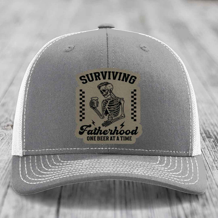 Surviving Fatherhood, One Beer At A Time - Leather Patch Hat - Light Brown to Black Patch - Richardson 112 Snapback Trucker Hat