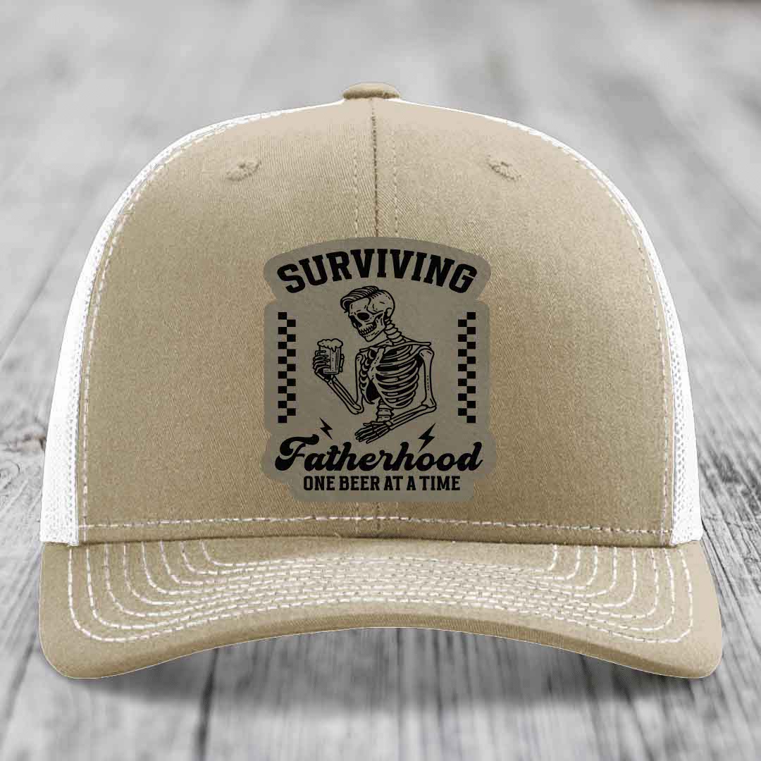 Surviving Fatherhood, One Beer At A Time - Leather Patch Hat - Light Brown to Black Patch - Richardson 112 Snapback Trucker Hat