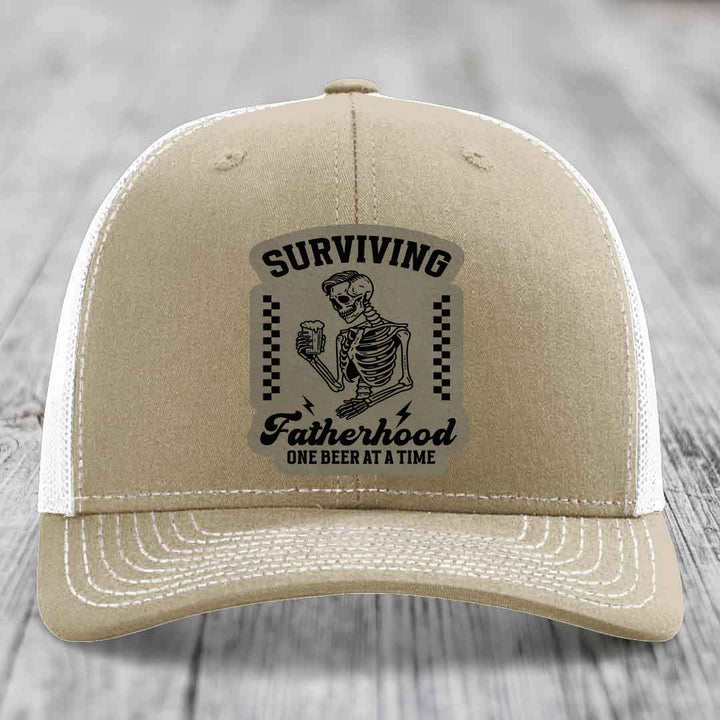Surviving Fatherhood, One Beer At A Time - Leather Patch Hat - Light Brown to Black Patch - Richardson 112 Snapback Trucker Hat
