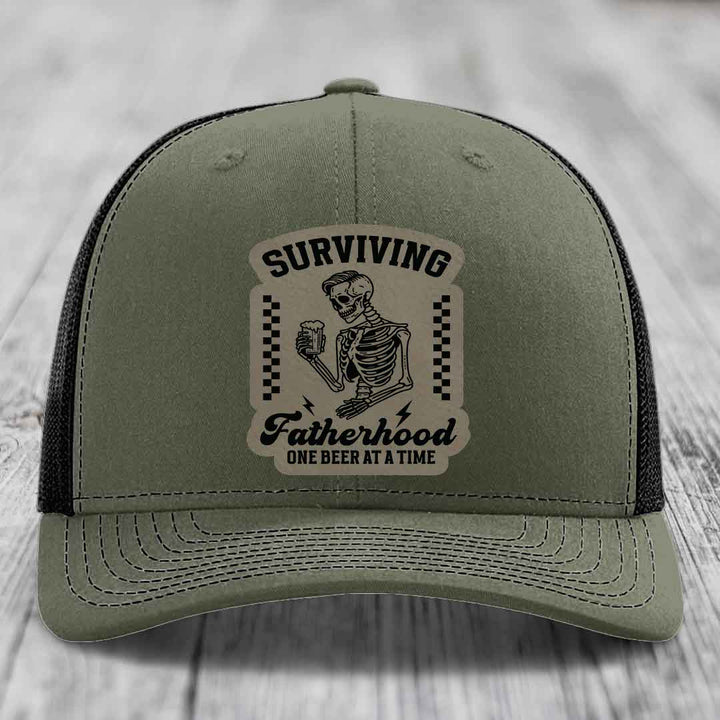 Surviving Fatherhood, One Beer At A Time - Leather Patch Hat - Light Brown to Black Patch - Richardson 112 Snapback Trucker Hat