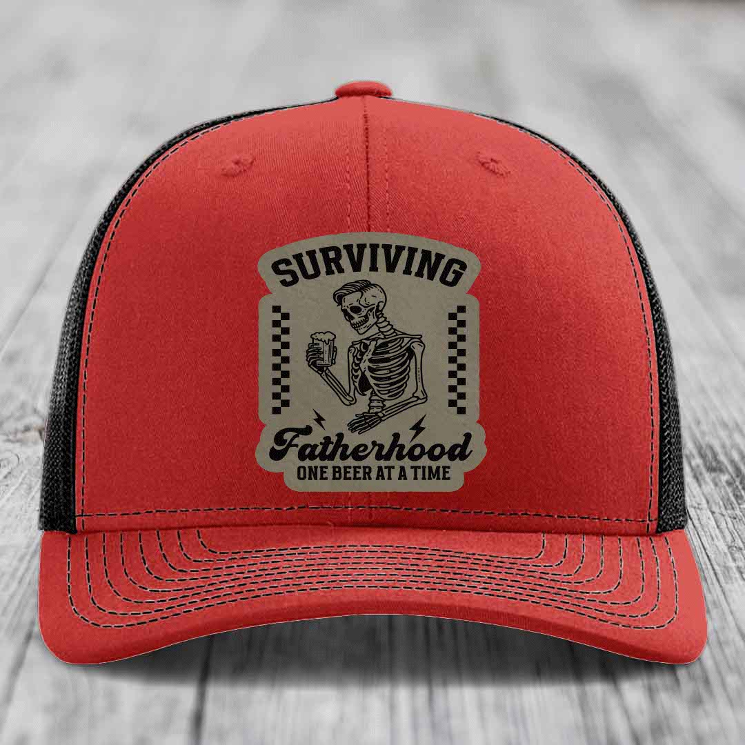 Surviving Fatherhood, One Beer At A Time - Leather Patch Hat - Light Brown to Black Patch - Richardson 112 Snapback Trucker Hat