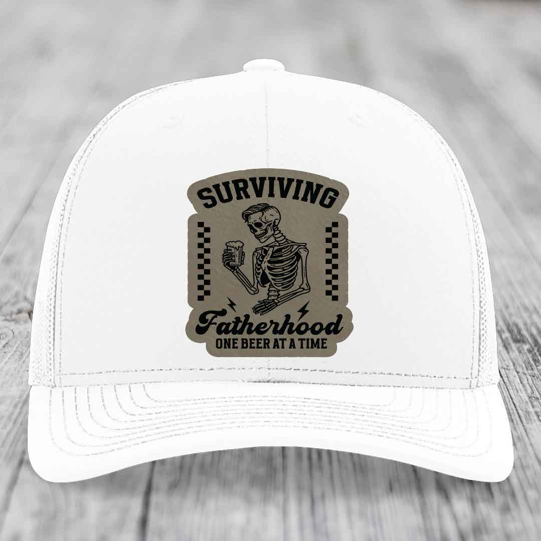 Surviving Fatherhood, One Beer At A Time - Leather Patch Hat - Light Brown to Black Patch - Richardson 112 Snapback Trucker Hat