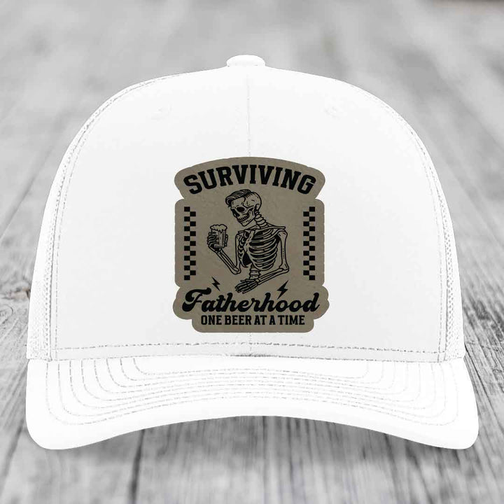 Surviving Fatherhood, One Beer At A Time - Leather Patch Hat - Light Brown to Black Patch - Richardson 112 Snapback Trucker Hat