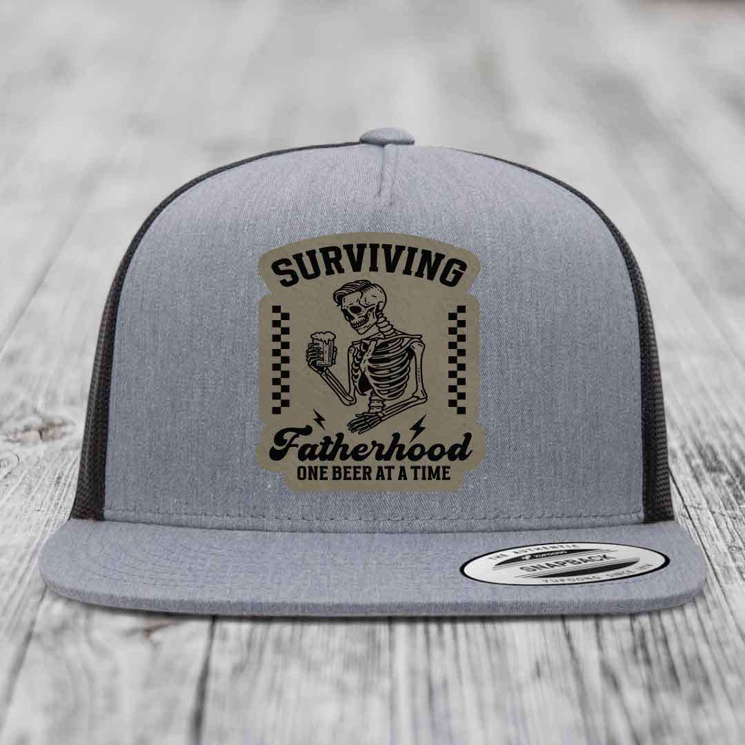 Surviving Fatherhood, One Beer At A Time - Leather Patch Hat - Light Brown to Black Patch - Yupoong 6006 Snapback Flatbill Hat